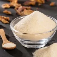 Hydrolyzed Protein in a bowl on a black surface